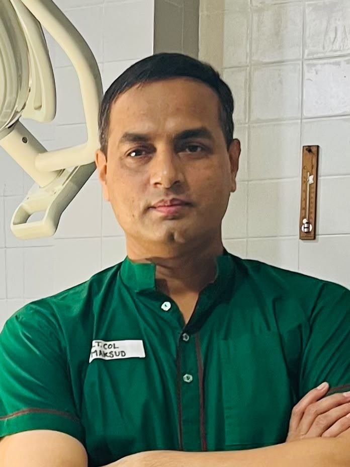 Dr. Mohammad Maksudur Rahman in white coat with stethoscope